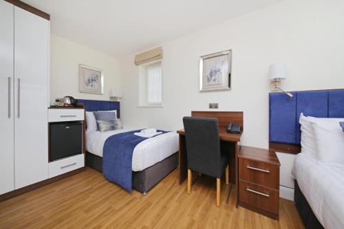 Habitación Familiar Deluxe Grande del hotel Imperial Guest House. Foto 2