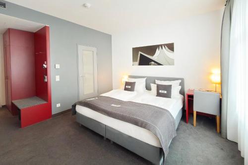 Habitación Estándar con bañera con ducha - 1 cama extragrande del hotel Garner Berlin - Gendarmenmarkt