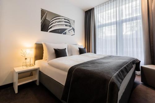 Habitación Estándar - Cama extragrande del hotel Garner Berlin - Gendarmenmarkt. Foto 5