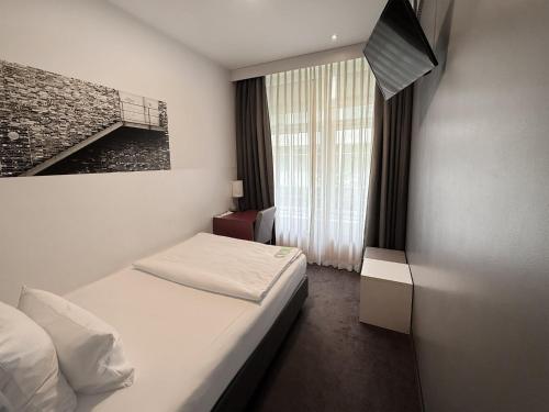 Habitación Estándar del hotel Garner Berlin - Gendarmenmarkt. Foto 11