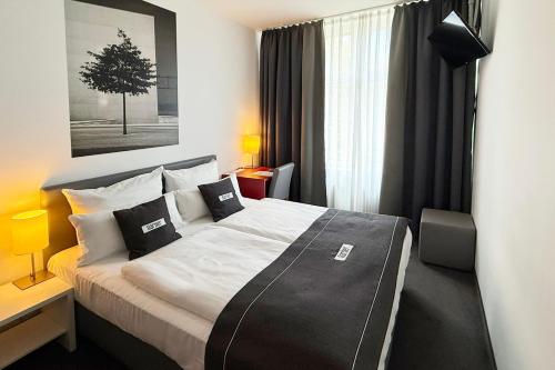 Habitación Estándar con bañera con ducha - 1 cama extragrande del hotel Garner Berlin - Gendarmenmarkt