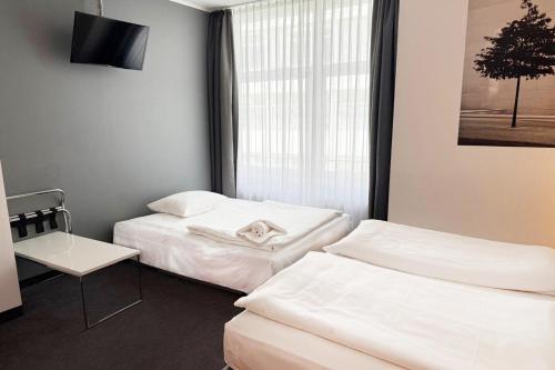 2 Single Premium Single Sofa Bed del hotel Garner Berlin - Gendarmenmarkt. Foto 4