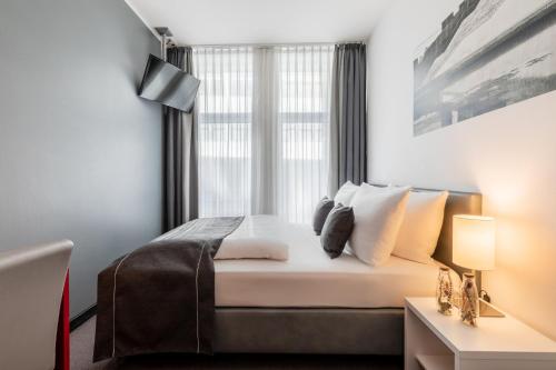 Habitación Individual del hotel Garner Berlin - Gendarmenmarkt. Foto 3