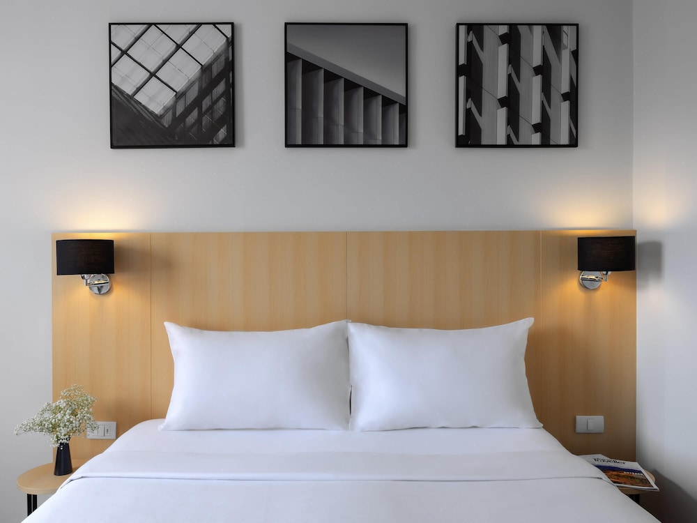 Habitación Superior con 1 Cama Queen del hotel Ibis Bangkok Sukhumvit 4. Foto 6