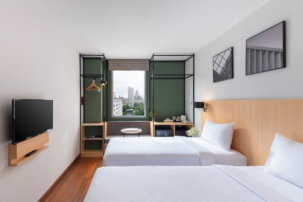 Habitación Superior con Dos Camas Individuales del hotel Ibis Bangkok Sukhumvit 4. Foto 2