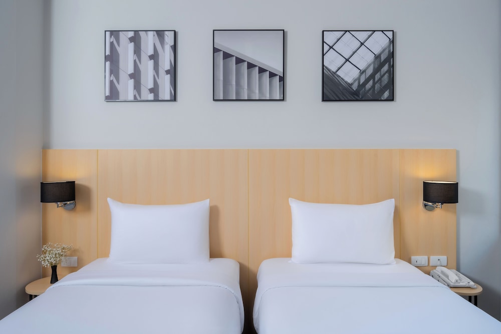 Habitación Superior con Dos Camas Individuales del hotel Ibis Bangkok Sukhumvit 4. Foto 3
