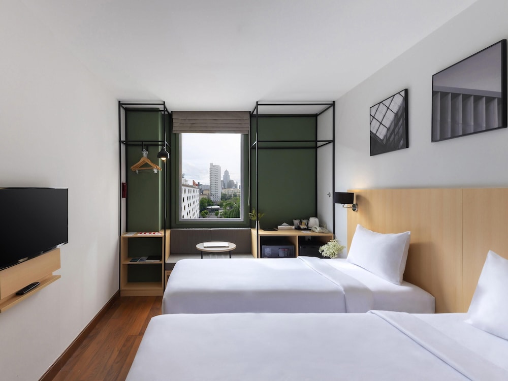 Habitación Superior con Dos Camas Individuales del hotel Ibis Bangkok Sukhumvit 4. Foto 6