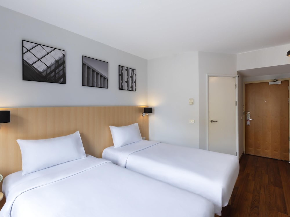 Habitación Superior con Dos Camas Individuales del hotel Ibis Bangkok Sukhumvit 4. Foto 7