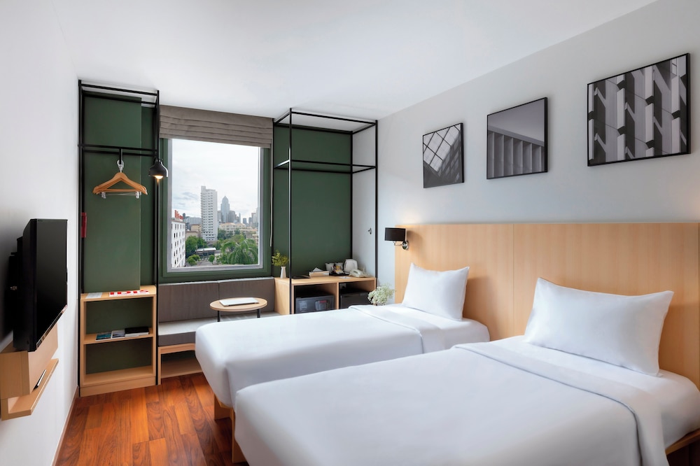 Habitación Superior con Dos Camas Individuales del hotel Ibis Bangkok Sukhumvit 4. Foto 8