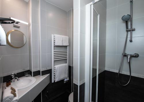 Habitación Triple del hotel Eiffel Villa Garibaldi