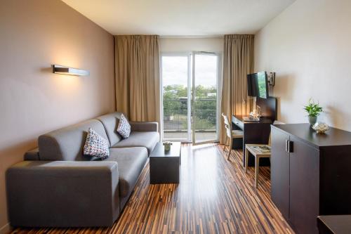 Apartamento Superior de 1 dormitorio del hotel Clarion Aparthotel Toulouse Le Parc de l’Escale. Foto 1