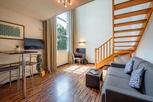 Superior One - Bedroom Apartment Duplex del hotel Clarion Aparthotel Toulouse Le Parc de l’Escale. Foto 1