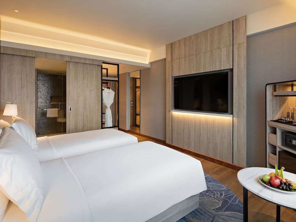 Habitación clásica, 2 camas individuales del hotel Mövenpick Jakarta City Centre. Foto 1