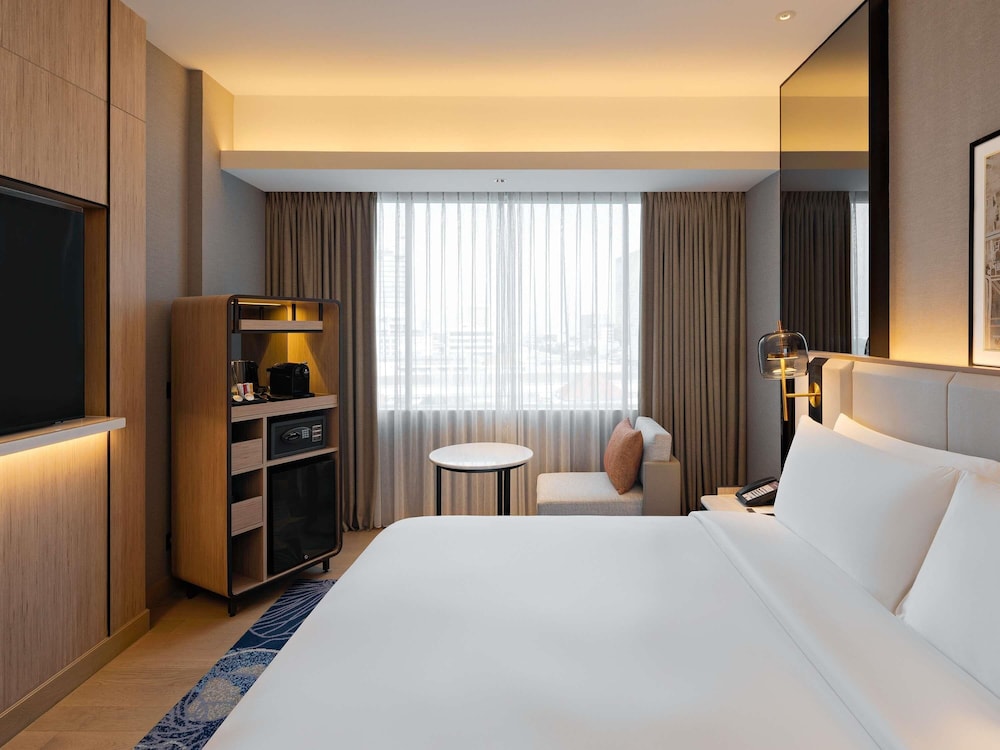 HABITACIÓN EJECUTIVA, 1 Cama Queen Size del hotel Mövenpick Jakarta City Centre. Foto 2