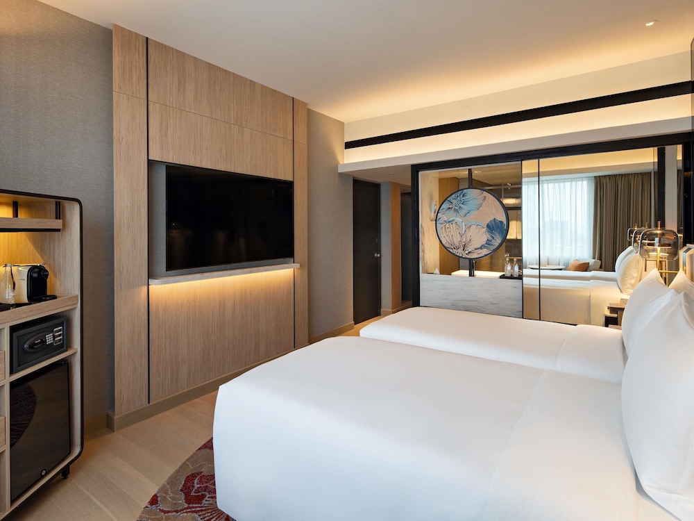 Habitación ejecutiva, 2 camas individuales del hotel Mövenpick Jakarta City Centre. Foto 1