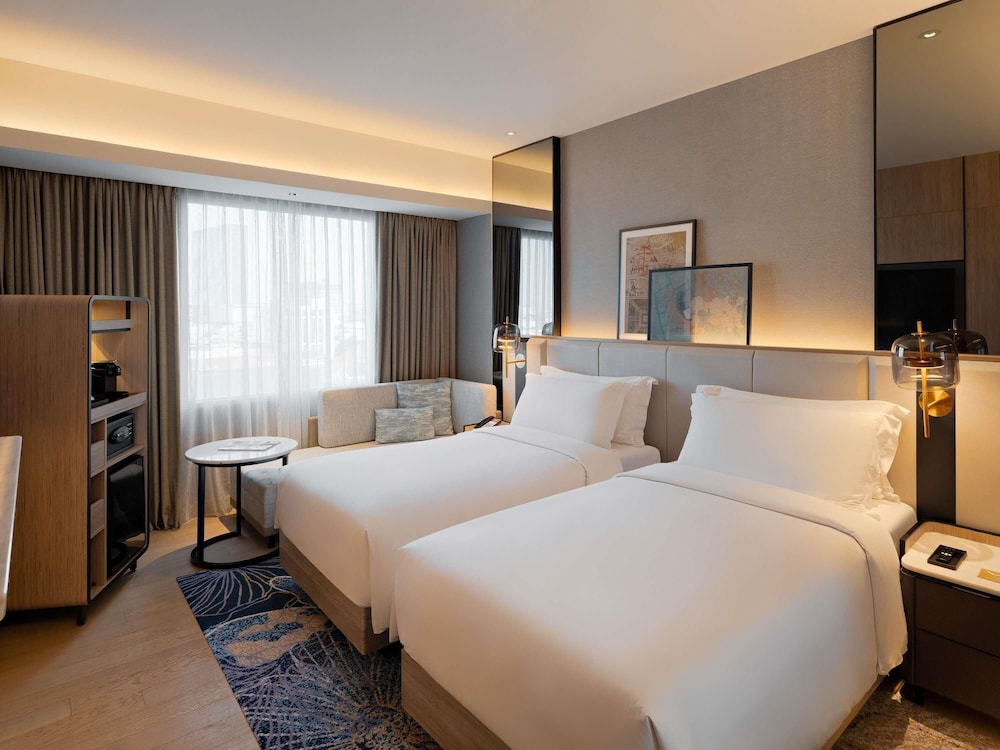 Habitación ejecutiva, 2 camas individuales del hotel Mövenpick Jakarta City Centre. Foto 2