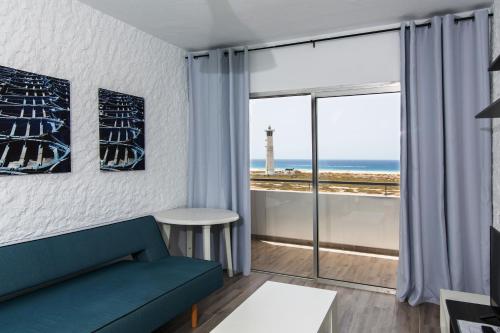 Apartamento Vista Mar Con Cocina Sofá Cama incluido 3 camas individuales Normal del hotel The Real Casa Atlantica Morro Jable. Foto 34