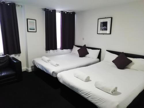 Habitación Triple Básica del hotel The Bank. Foto 3