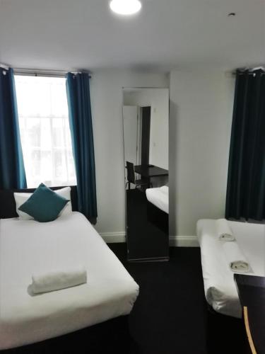 Habitación Familiar Deluxe del hotel The Bank. Foto 2