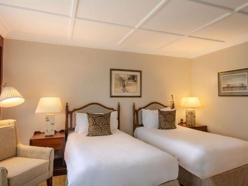 Habitación Deluxe con Patio Interior y 2 Camas Individuales del hotel Fairmont The Norfolk. Foto 2