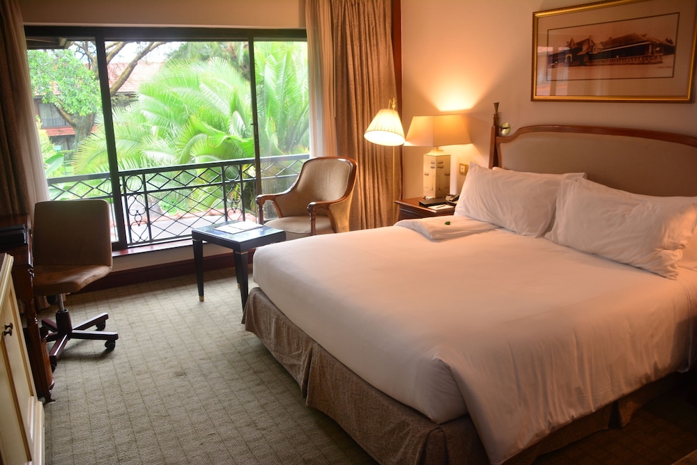 Habitación Deluxe con Patio Interior y Cama King del hotel Fairmont The Norfolk. Foto 1