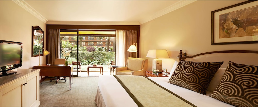 Habitación Deluxe con Patio Interior y Cama King del hotel Fairmont The Norfolk. Foto 5