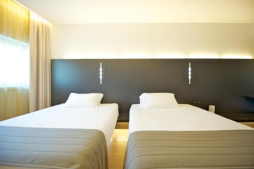 Habitación Classic con 2 camas individuales del hotel Mercure Nerocubo Rovereto. Foto 3
