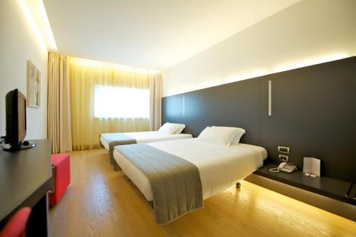 Habitación Classic con 2 camas individuales del hotel Mercure Nerocubo Rovereto. Foto 4
