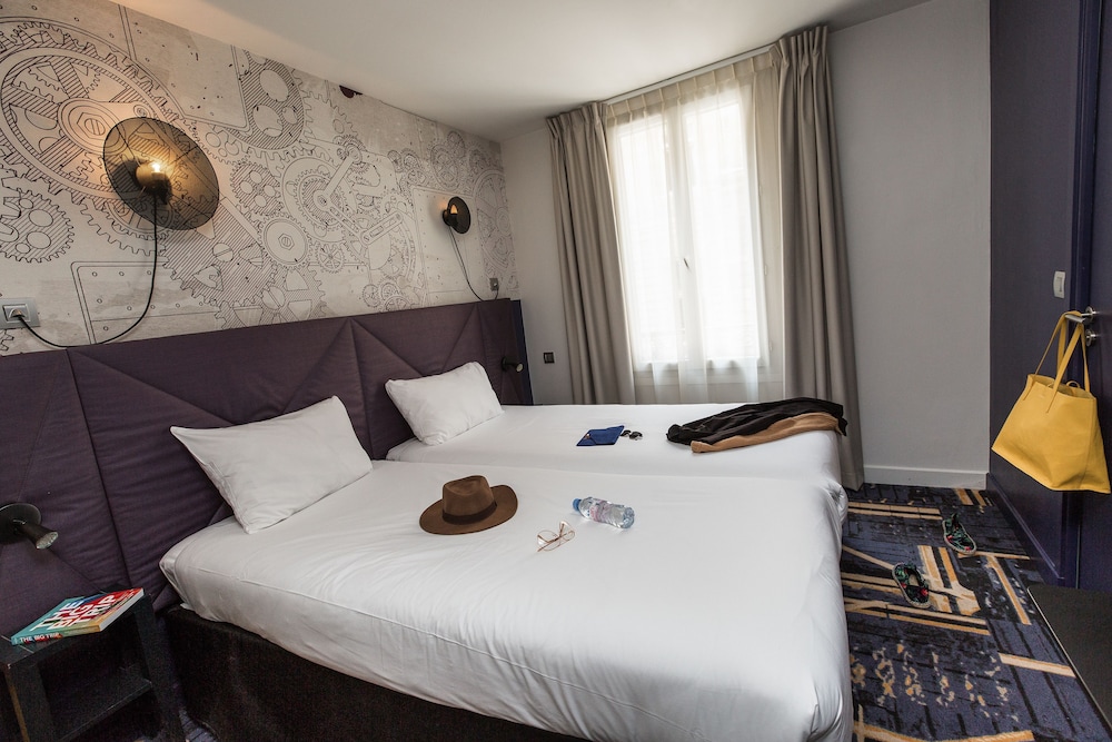 Habitación estándar con dos camas individuales del hotel Ibis Styles Paris Mairie De Clichy. Foto 2