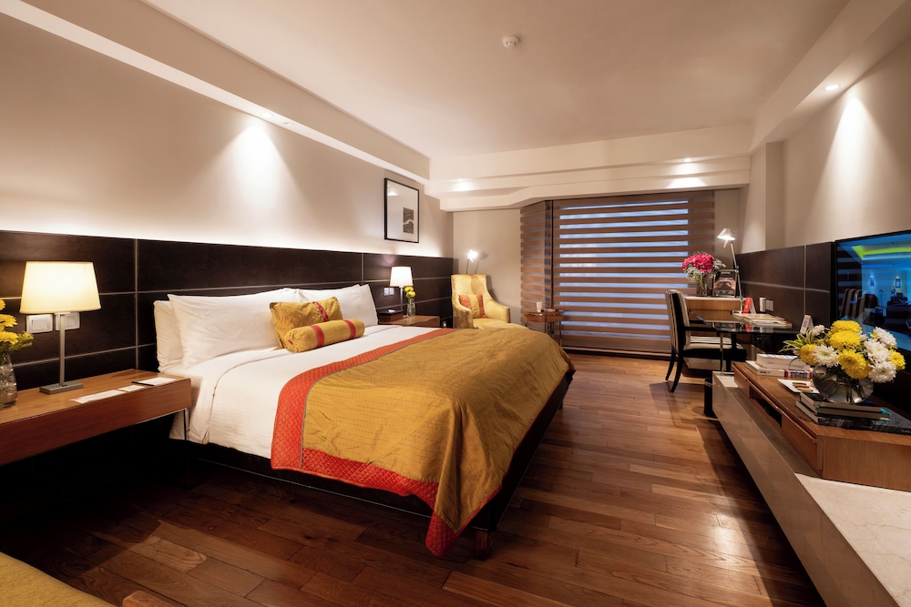 Habitación Deluxe King del hotel The Lalit New Delhi. Foto 1