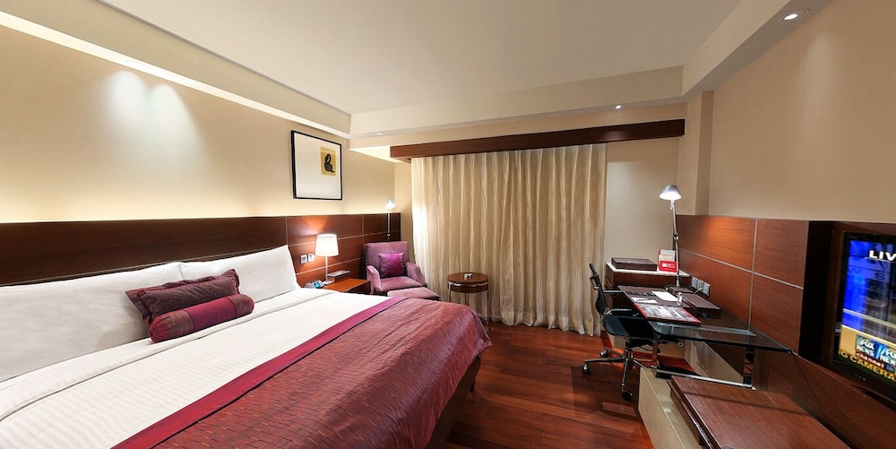Suite de esquina del hotel The Lalit New Delhi