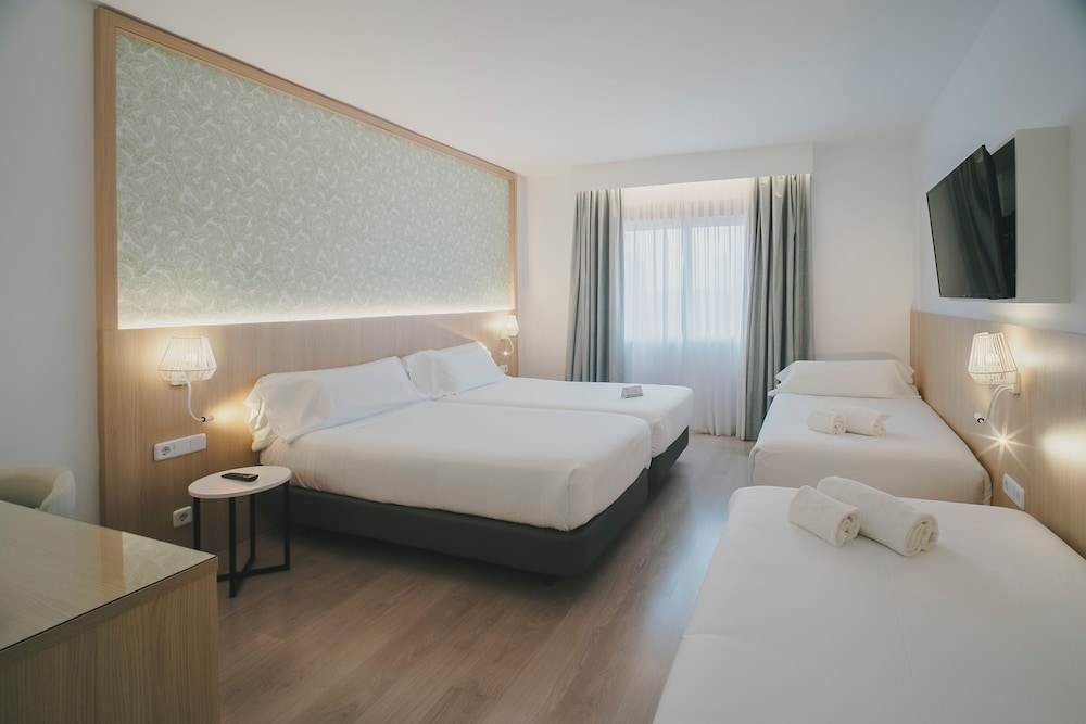 Habitación Familiar del hotel Sercotel Carlos Iii