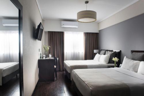 Habitación Triple del hotel Rochester Classic