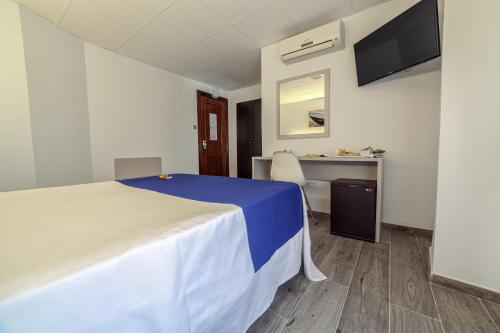 Habitación Individual del hotel La Perla. Foto 1