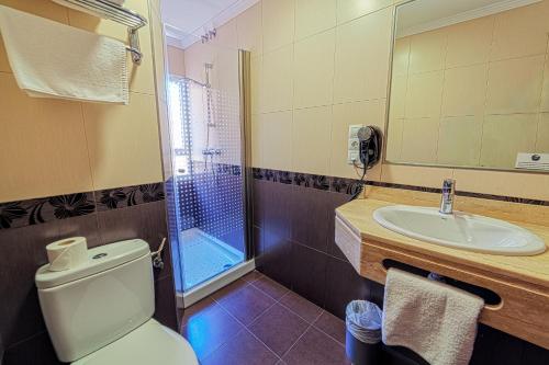 Habitación Triple del hotel La Perla. Foto 4