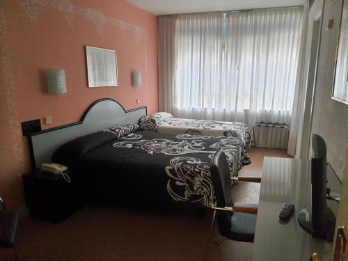 Habitación Triple del hotel Arha Santander. Foto 7