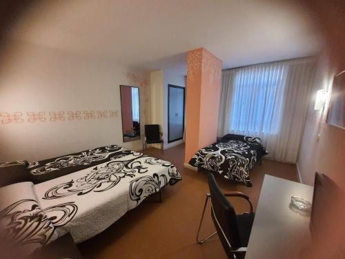 Habitación Triple del hotel Arha Santander. Foto 9