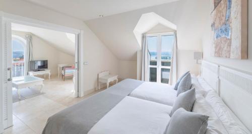 Habitación doble con salón del hotel Gran Suances. Foto 9
