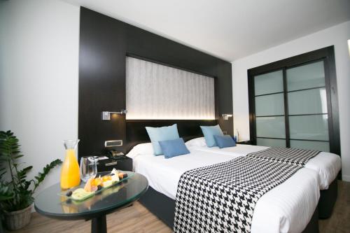 Habitación Doble Superior - 2 camas del hotel Intelier Rosa