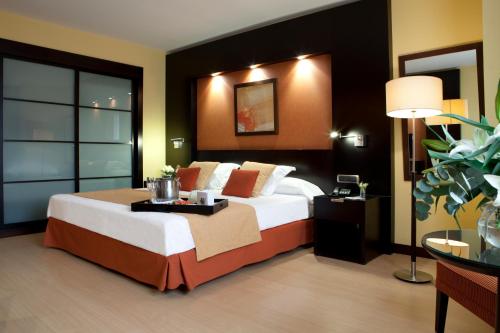 Habitación Triple Estándar del hotel Intelier Rosa