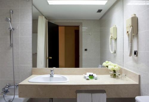 Habitación Triple Estándar del hotel Intelier Rosa. Foto 3