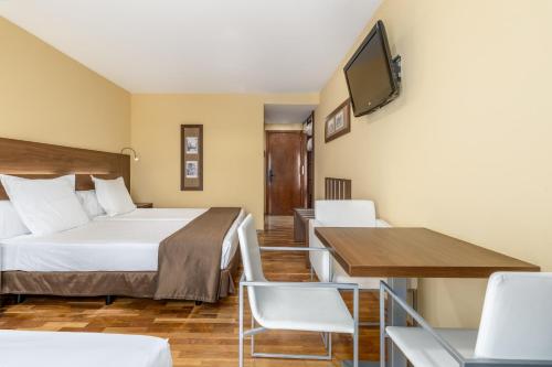 Habitación Triple del hotel Exe Doña Carlota. Foto 3