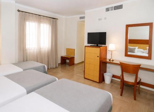 Habitación con cama supletoria - 1 o 2 camas del hotel Córdoba Centro. Foto 1