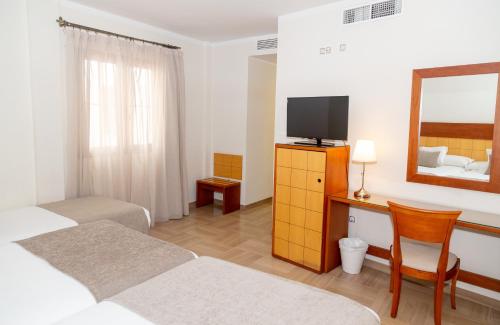 Habitación con cama supletoria - 1 o 2 camas del hotel Córdoba Centro. Foto 3