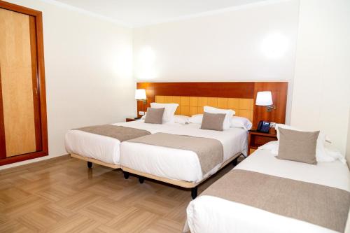 Habitación con cama supletoria - 1 o 2 camas del hotel Córdoba Centro. Foto 6