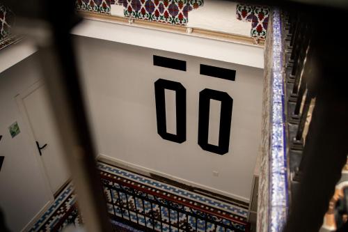 Cama en habitación compartida femenina de 4 camas con baño privado del hotel Room00 Salvador. Foto 2