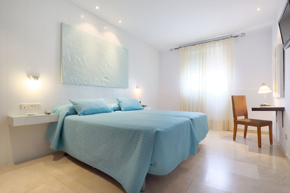 Habitación Confort con 2 camas individuales, no fumadores del hotel Oasis Cordoba. Foto 2