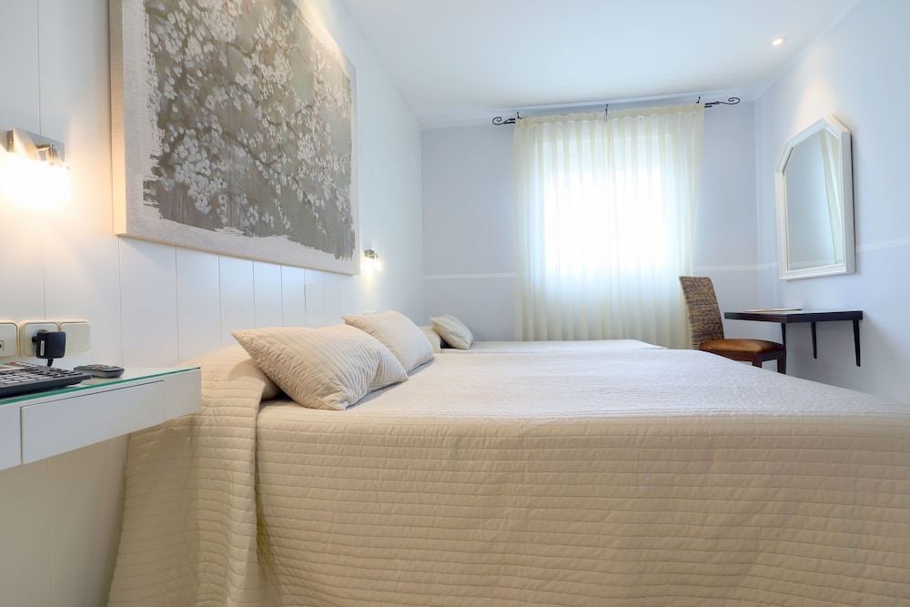 Habitación Confort con 2 camas individuales, no fumadores del hotel Oasis Cordoba. Foto 7