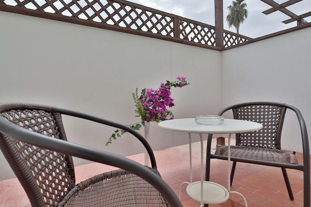 Habitación con 2 camas individuales del hotel Oasis Cordoba