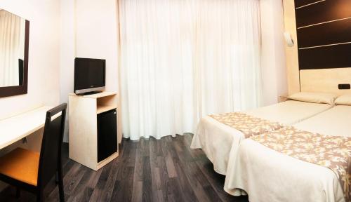 Habitación Doble - 1 o 2 camas del hotel Universal. Foto 2